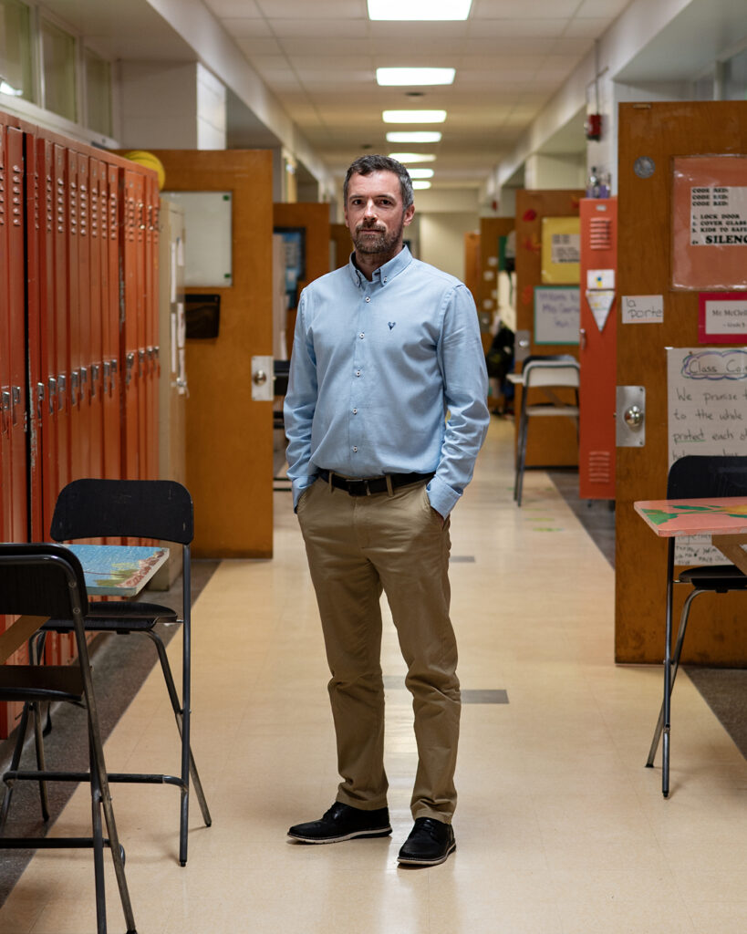 Mr. Fleming standing in the middle of the upstairs hallway at GG // M. Fleming au milieu du couloir de l'étage à GG 